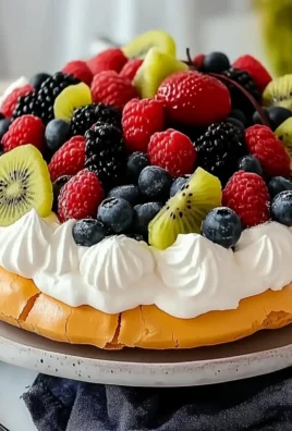 Delicious Pavlova Recipe with Whipped Cream and Fresh Fruit