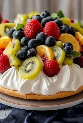 Delicious Pavlova Recipe with Whipped Cream and Fresh Fruit