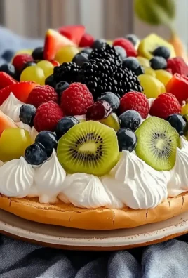 Delicious Pavlova Recipe with Whipped Cream and Fresh Fruit