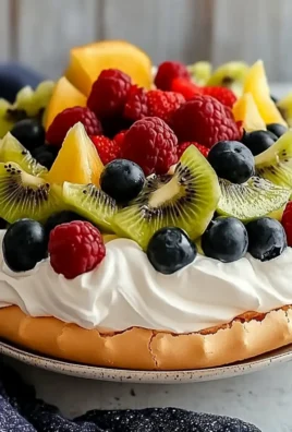 Delicious Pavlova Recipe with Whipped Cream and Fresh Fruit
