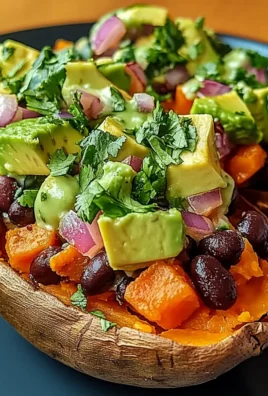 Stuffed Sweet Potato with Avocado, Black Beans & Cilantro Lime Crema